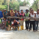 Construction workers and members of Malaysia’s civil defence force pose with the python. Image: Herme Herisyam, Malaysia’s Civil Defence Force